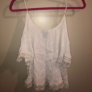 Shoulder cut out white flowy top